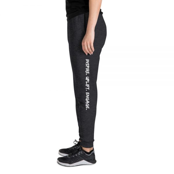 Woman wearing Black Heather Inspire. Uplift. Engage. Joggers left profile The Ashe Academy Store